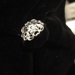Sterling Silver flowered designed ring.